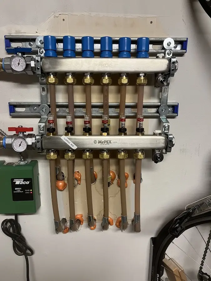 Plumber performing Water Heater Repair at a residential property in East Cocalico